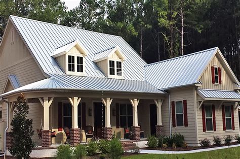 black and white metal house|white house with galvalume roof.